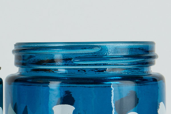 وعاء تخزين زجاجي أزرق