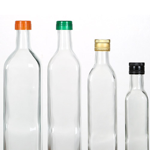 botella de aceite de oliva transparente