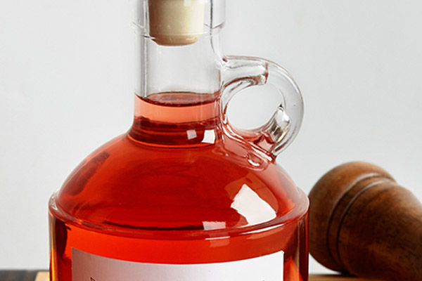 glass liquor bottle with cork
