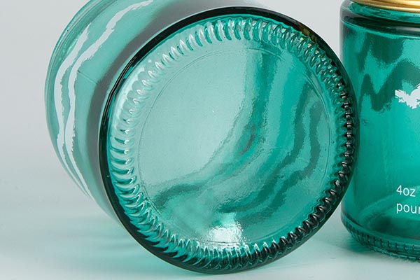 green glass storage jar