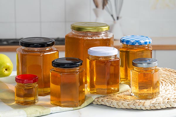 vasetti di miele esagonali